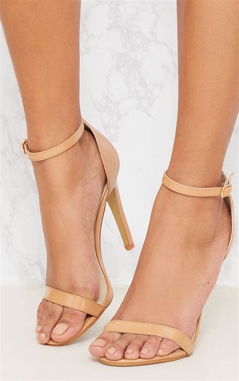 neutral strappy heeled sandals.